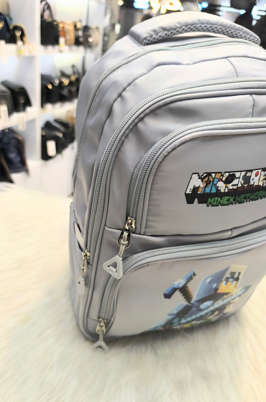 کوله پشتی پسرانه ماینکرافت رنگ طوسی جنس خارجی